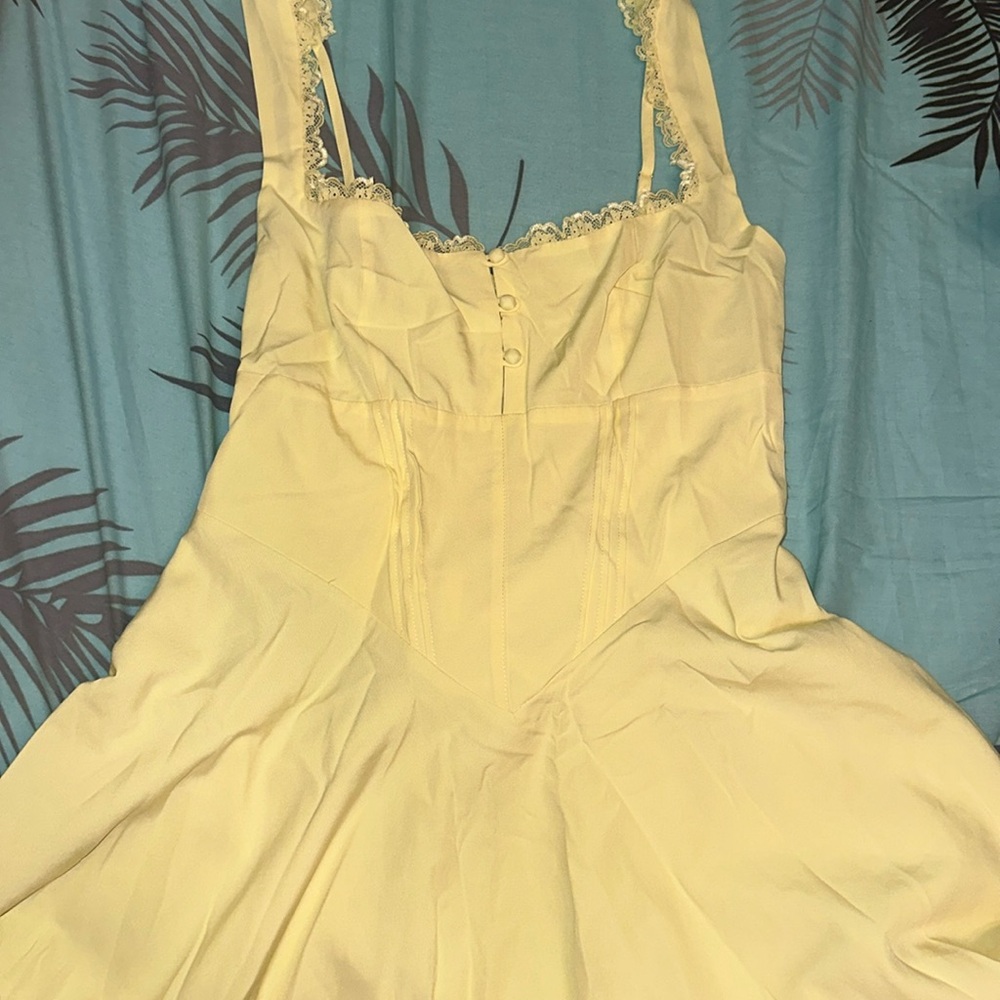 BRAND NEW yellow mini dress with some corset detailing 🧡💛
